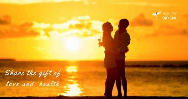 healthy couple enjoying the sunset and loving each other
